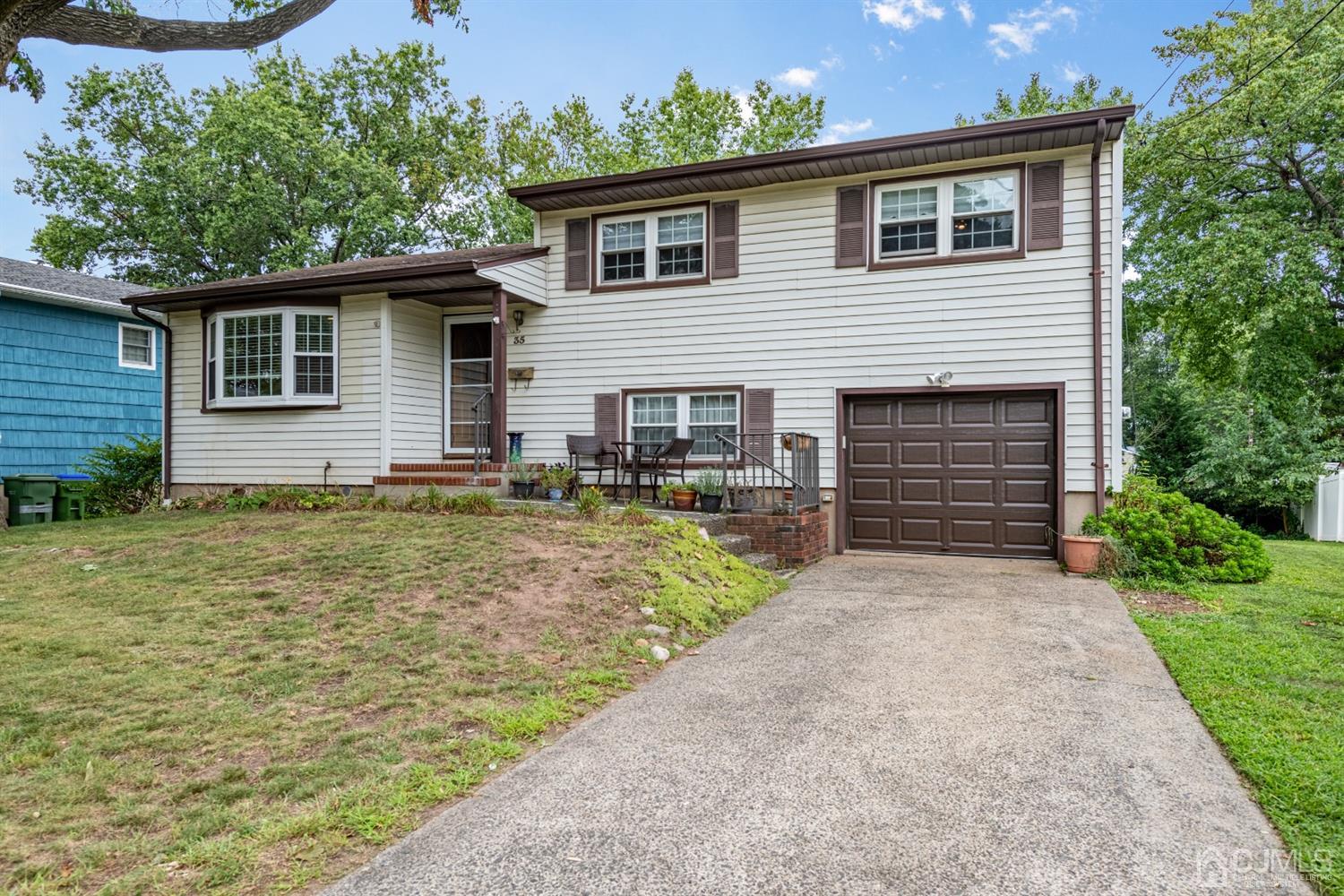 35 Larchmont Road Edison, NJ 08837 - Photo 1 of 23 a front view of house with yard