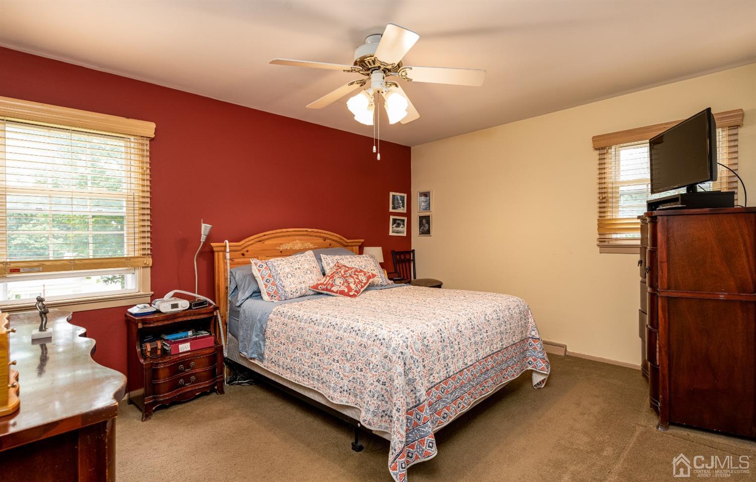 35 Larchmont Road Edison, NJ 08837 - Photo 12 of 23 a bedroom with a bed and a tv