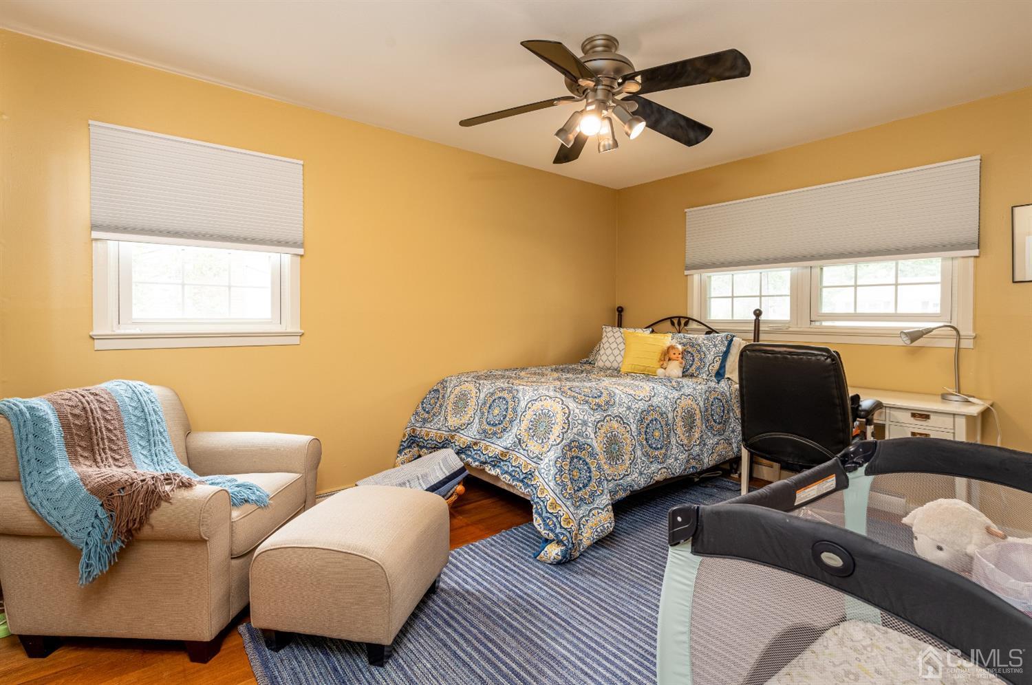 35 Larchmont Road Edison, NJ 08837 - Photo 15 of 23 a bedroom with furniture and a large window
