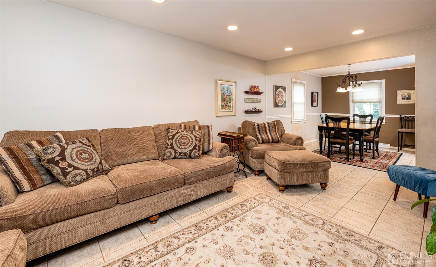 35 Larchmont Road Edison, NJ 08837 - Photo 5 of 23 a living room with furniture and kitchen view