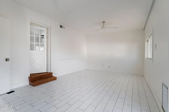 wooden floor and window in a room