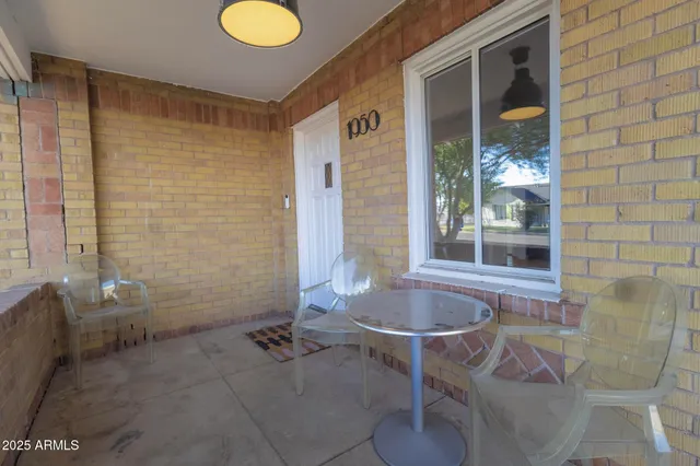 a bathroom with a tub and shower