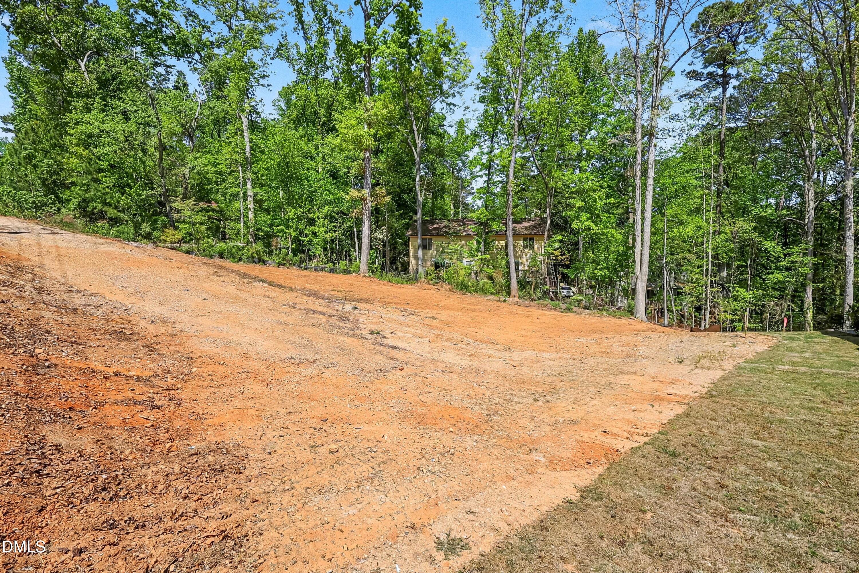904 Southwest Maynard Road Cary, NC 27511 - Photo 2 of 18 a view of a backyard of a house