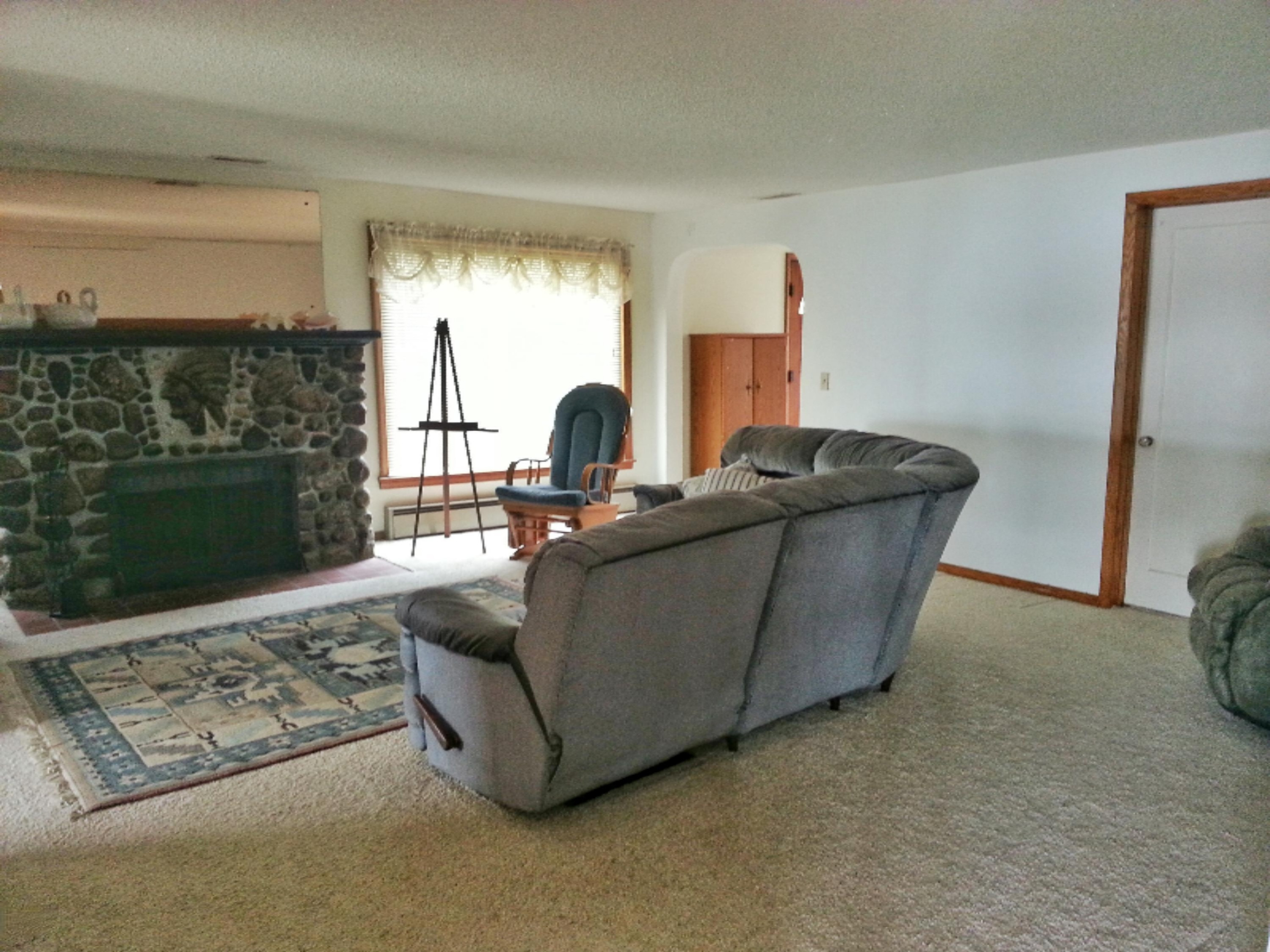 1195 South Ransom Road White Cloud, MI 49349 - Photo 19 of 24 living room with fire place
