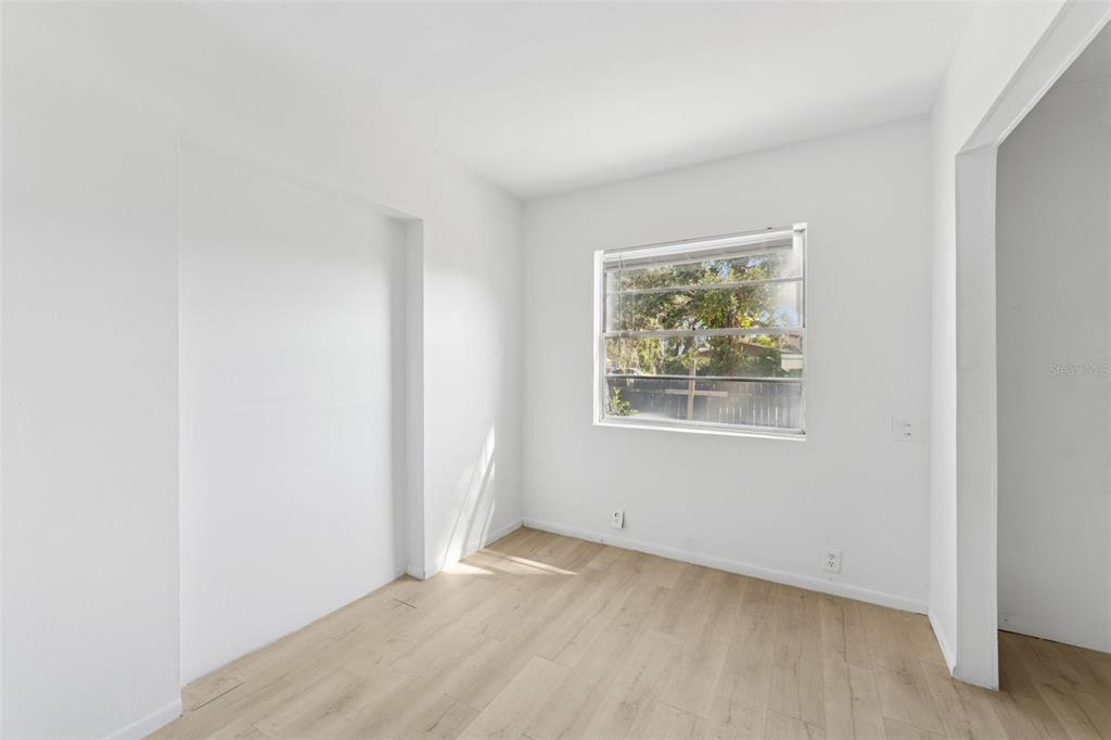 3102 West Leroy Street, Unit A Tampa, FL 33607 - Photo 16 of 21 an empty room with windows