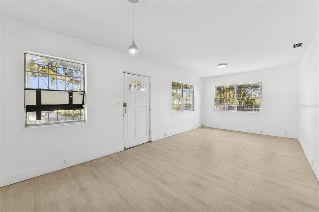 3102 West Leroy Street, Unit A Tampa, FL 33607 - Photo 6 of 21 a view of an empty room with a window