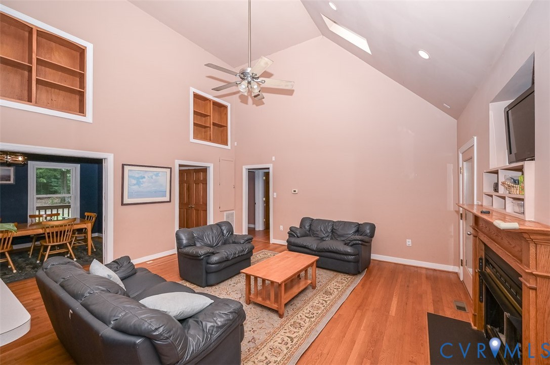 6040 Hare Road Henrico, VA 23231 - Photo 10 of 54 Vaulted ceiling with skylight and ceiling fan