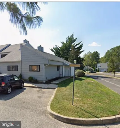 a house view with a swimming pool