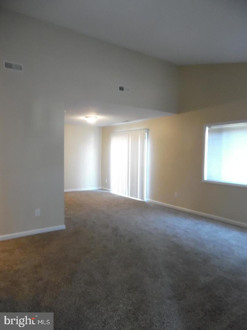 60 Dover Drive Lindenwold, NJ 08021 - Photo 11 of 24 a view of an empty room with a window