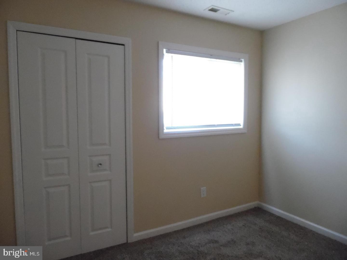 60 Dover Drive Lindenwold, NJ 08021 - Photo 23 of 24 an empty room with a window