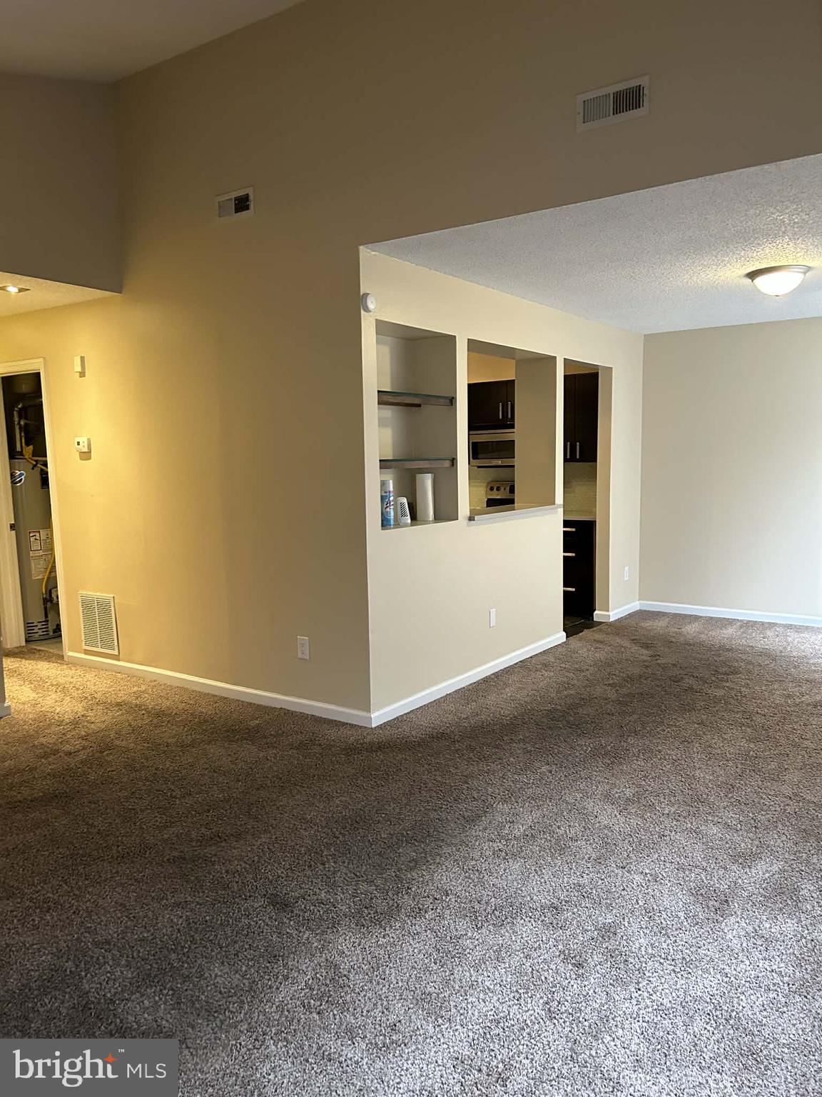 60 Dover Drive Lindenwold, NJ 08021 - Photo 9 of 24 a view of an empty room with wooden floor and a window