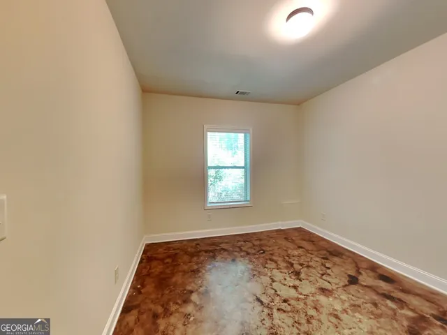 an empty room with a window