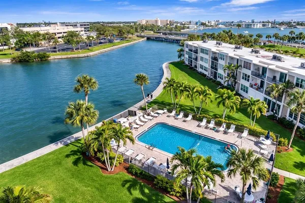 an aerial view of a house with a lake view