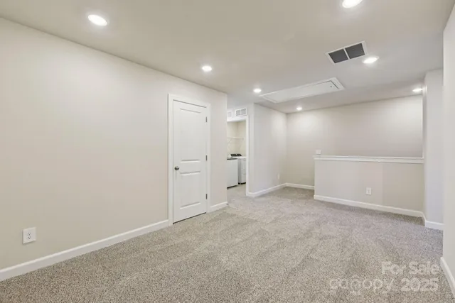 an empty room with white walls and white walls