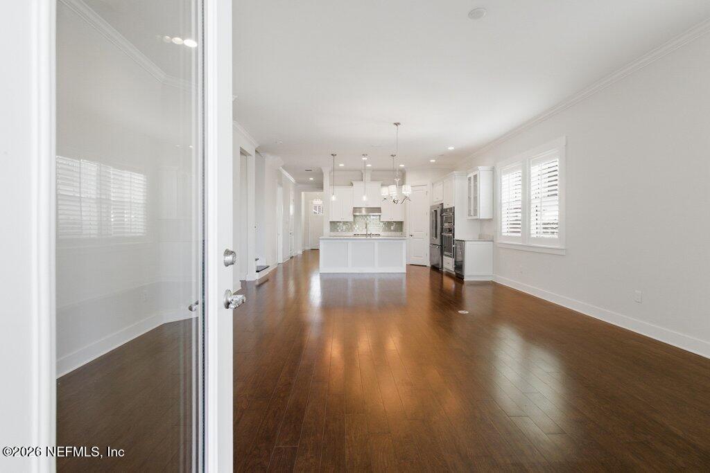 569 Timber Bridge Lane Atlantic Beach, FL 32233 - Photo 29 of 81 a view of empty room with wooden floor