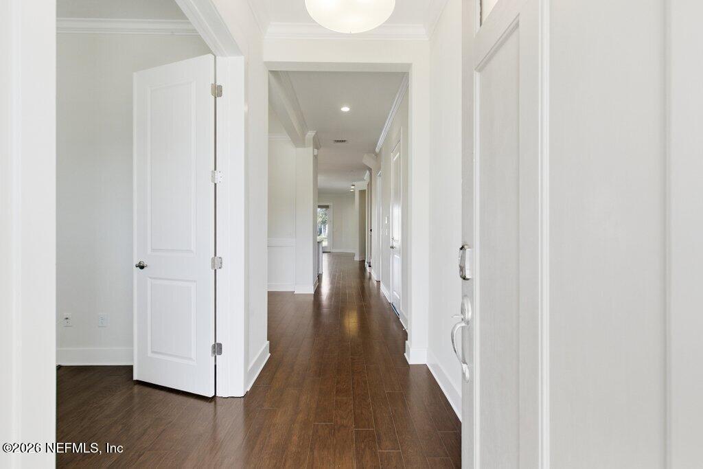569 Timber Bridge Lane Atlantic Beach, FL 32233 - Photo 8 of 81 a view of a hallway with wooden floor