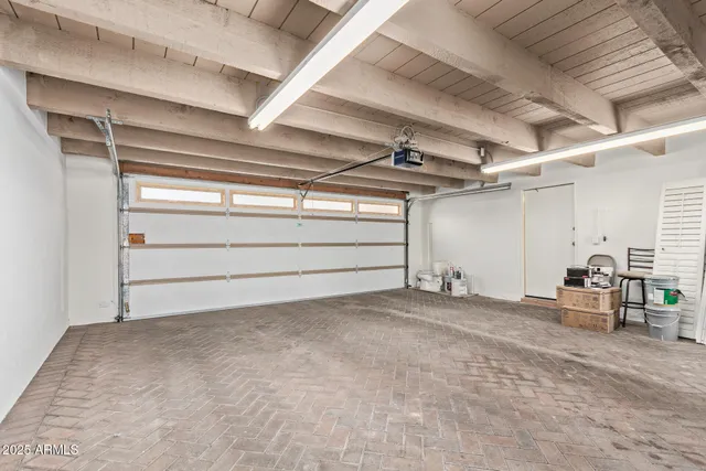 a view of an empty room with a sliding door