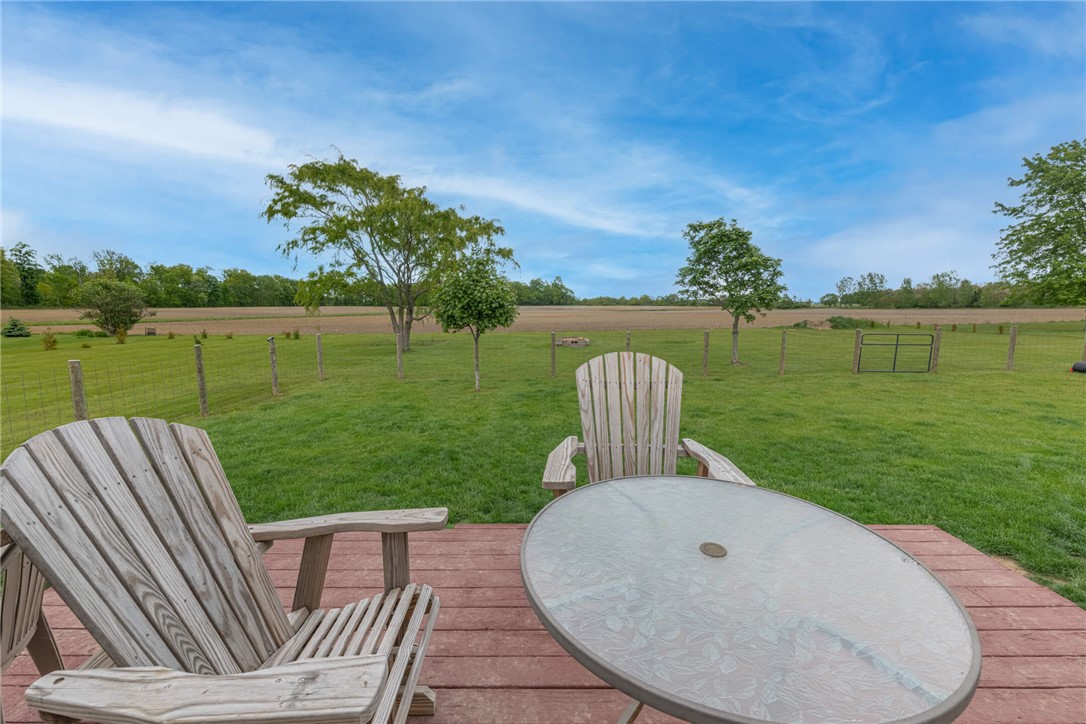 2645 Vance Road St. Paris, OH 43072 - Photo 27 of 35 Relax on the spacious deck and take in pastoral views stretching to the distant fields.