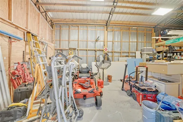 a view of a backyard with swimming pool