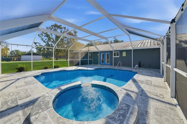 a kitchen with stainless steel appliances a stove and a refrigerator