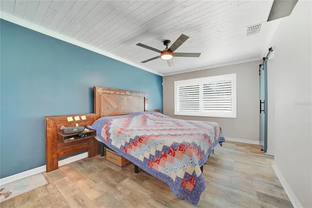 aerial view of a house with backyard space and garden