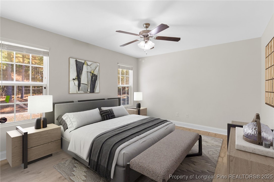 64 Humvee Court Broadway, NC 27505 - Photo 17 of 38 a bedroom with a bed and a window