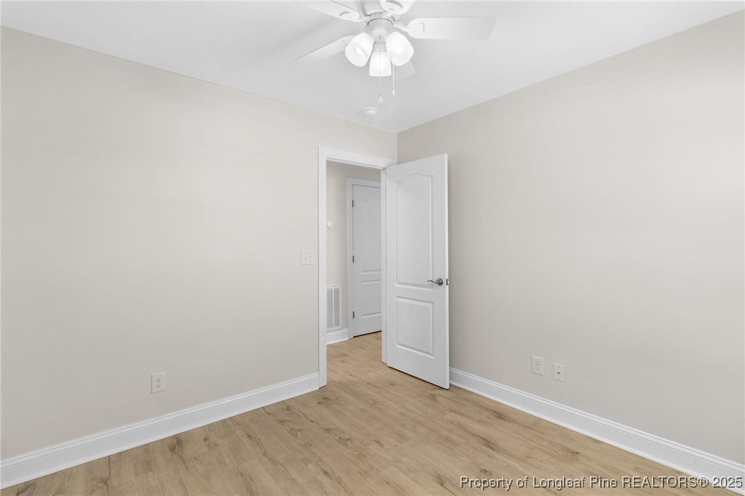 64 Humvee Court Broadway, NC 27505 - Photo 25 of 38 wooden floor in an empty room