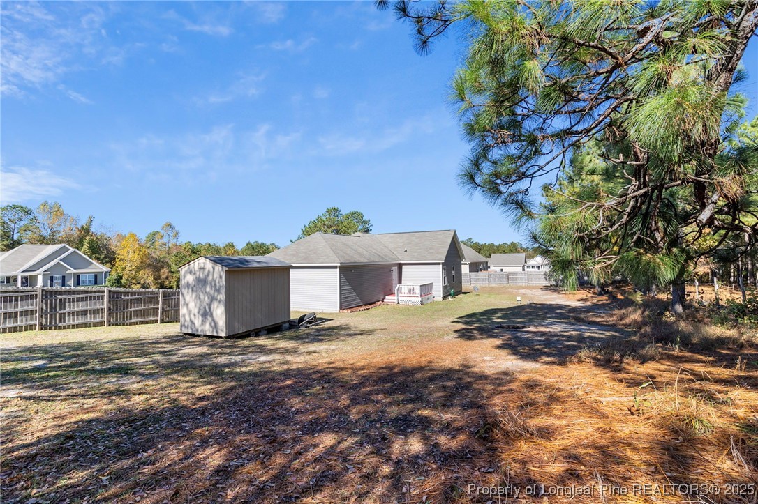 64 Humvee Court Broadway, NC 27505 - Photo 35 of 38 a view of a house with a yard