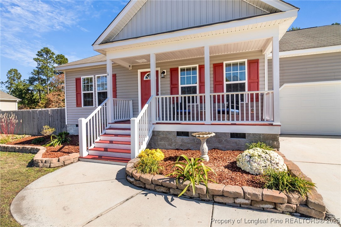 64 Humvee Court Broadway, NC 27505 - Photo 5 of 38 front view of a house with a chairs