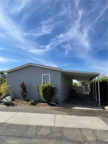 a view of a potted plants in middle of the house