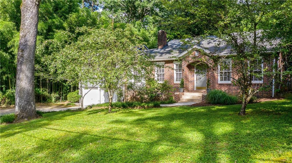 1165 Houston Mill Road Northeast Atlanta, GA 30329 - Photo 1 of 1 Stunningly updated bungalow on private lot in sought-after community near Emory, Druid Hills, and Toco Hills!