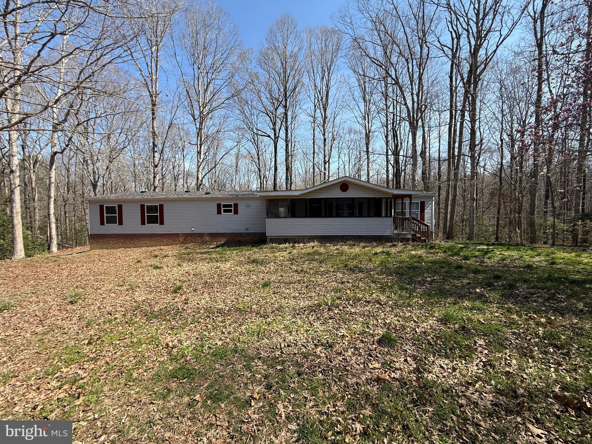 23980 McIntosh Road Hollywood, MD 20636 - Photo 2 of 2 a house view with wooden fence