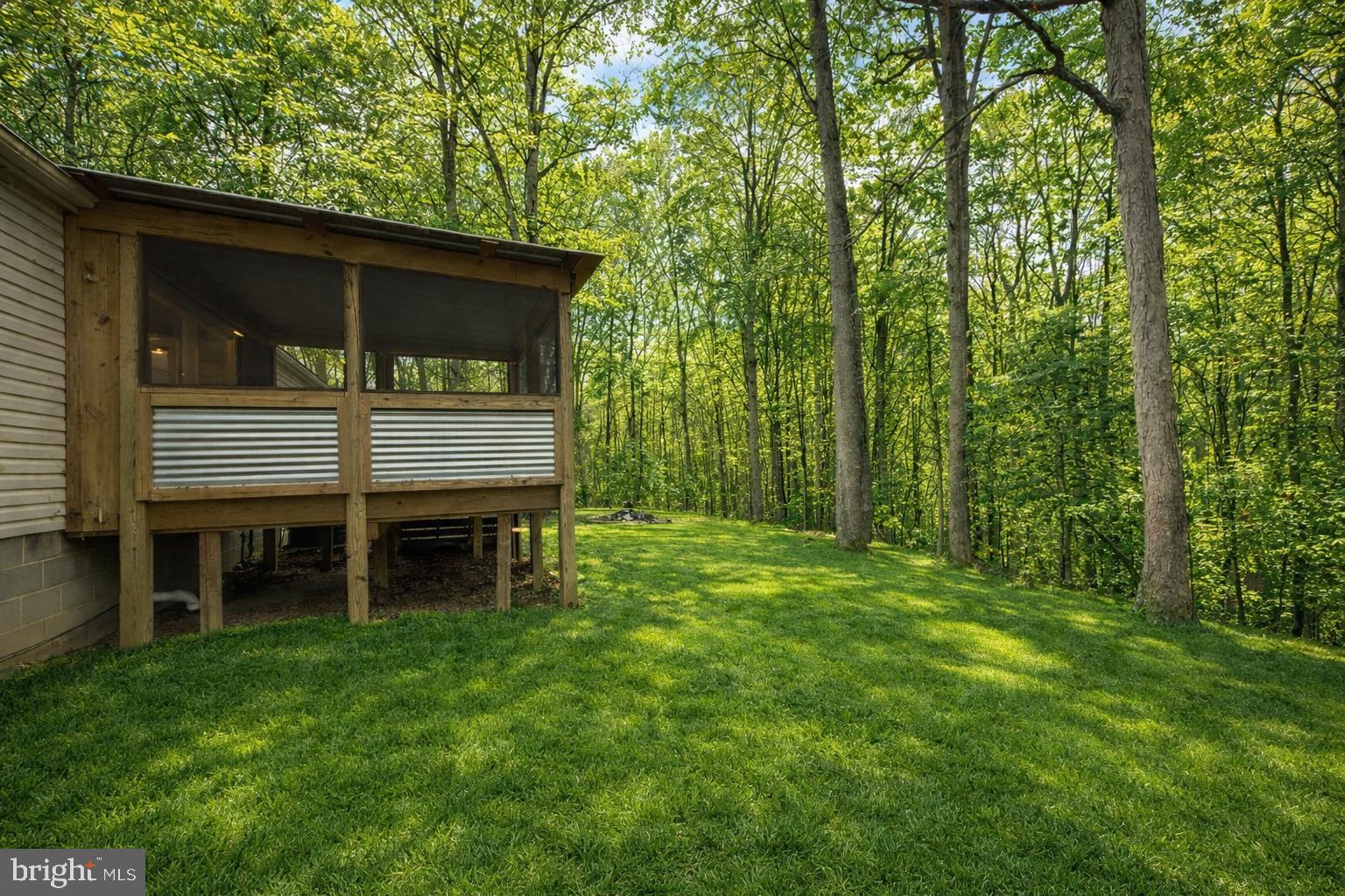 23980 McIntosh Road Hollywood, MD 20636 - Photo 5 of 8 Rear deck *Photos enhanced*