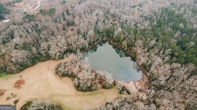 a view of a dry yard covered with snow
