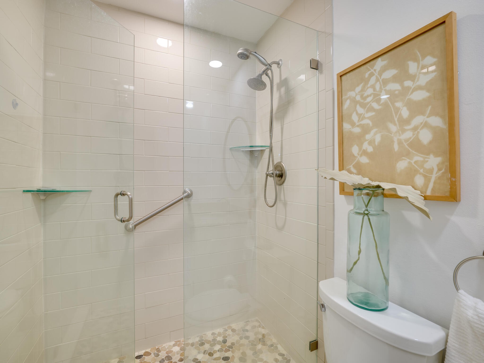 3203 Foster Lane Austin, TX 78757 - Photo 21 of 37 Closer view of the walk in shower with floor to ceiling tiles.