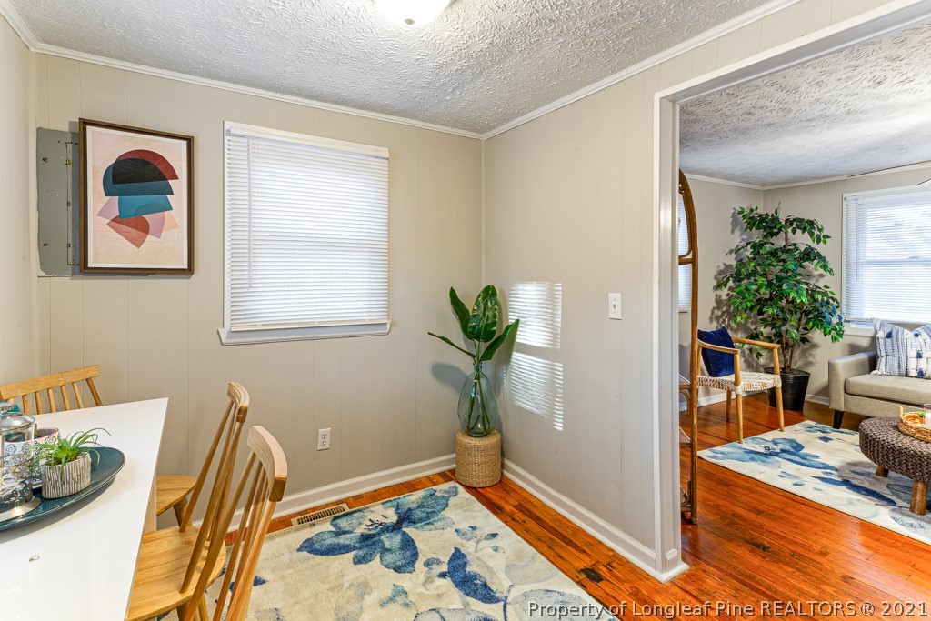 227 H T Kelly Road Cameron, NC 28326 - Photo 13 of 29 a view of kitchen with furniture and wooden floor