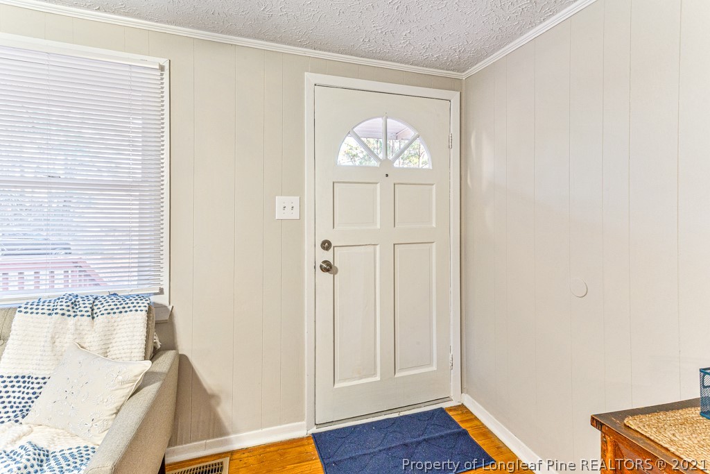 227 H T Kelly Road Cameron, NC 28326 - Photo 7 of 29 a view of front door with wooden floor
