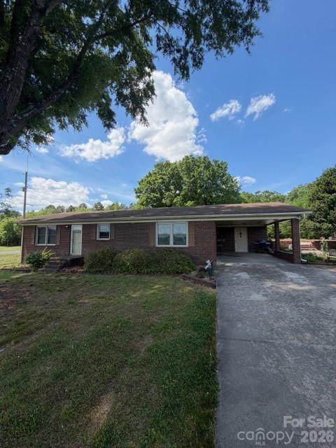 20415 Efird Road Albemarle, NC 28001 - Photo 2 of 16 a view of a backyard with a garden