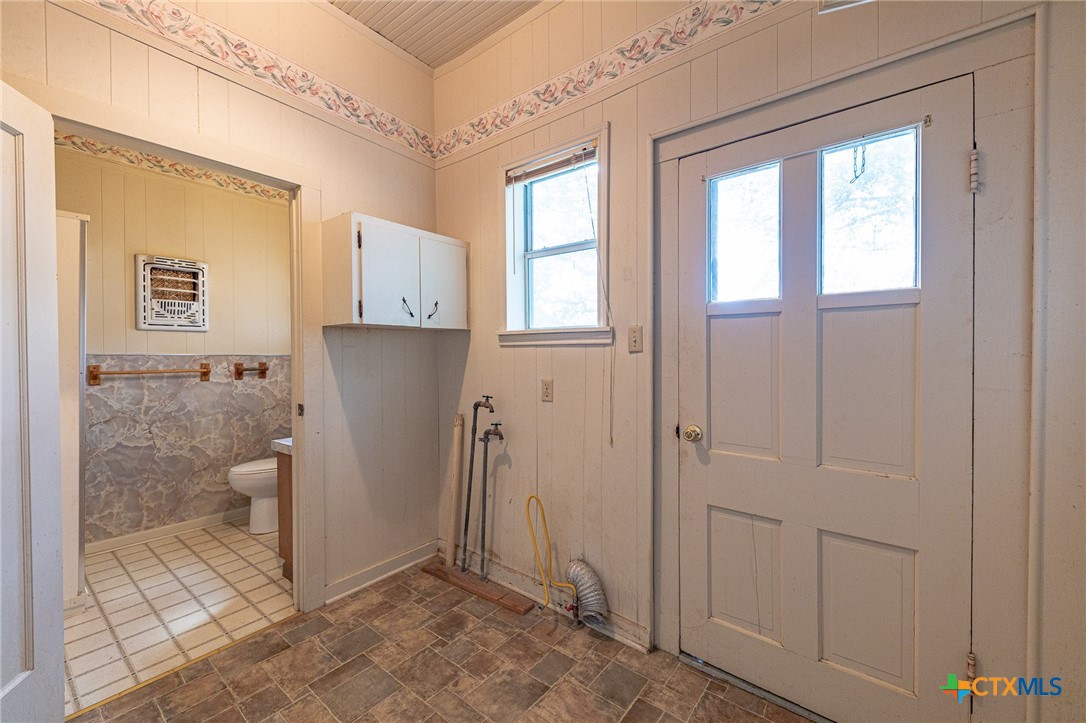 1306 Ave G Shiner, TX 77984 - Photo 14 of 23 a view of a bathroom with sink and shower