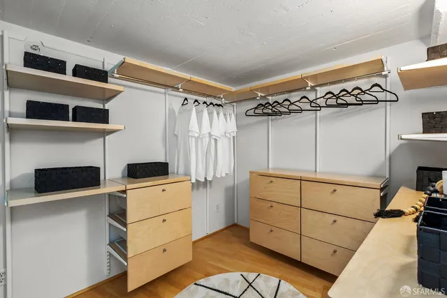 a kitchen with cabinets and window