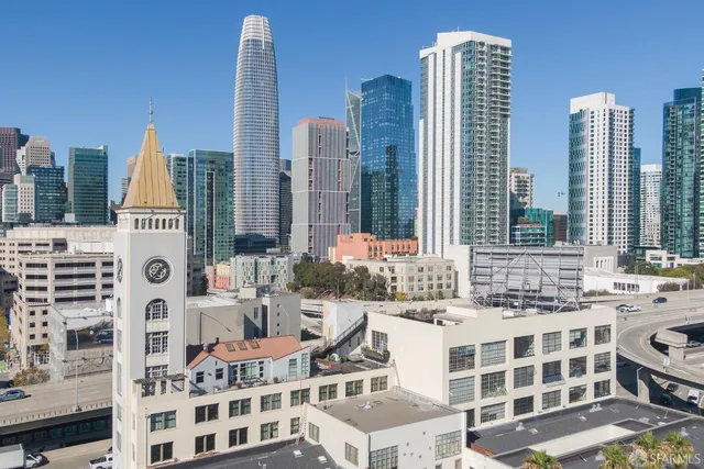 a view of a city with tall buildings