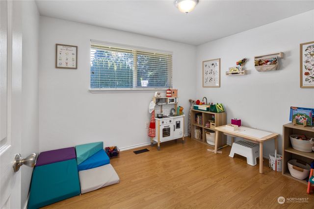 a room with furniture and a window