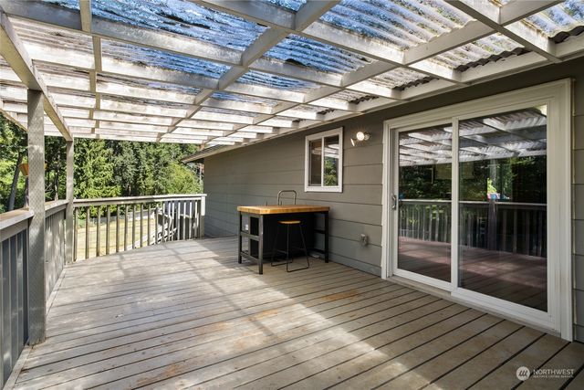 a view of a lake with a sitting area