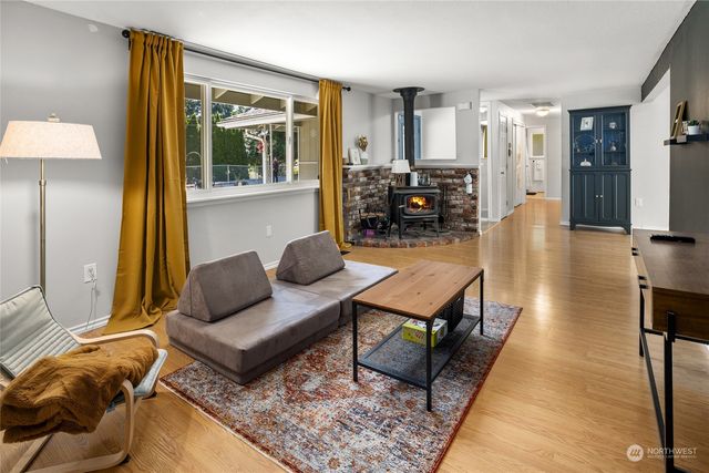 a living room with furniture and a table