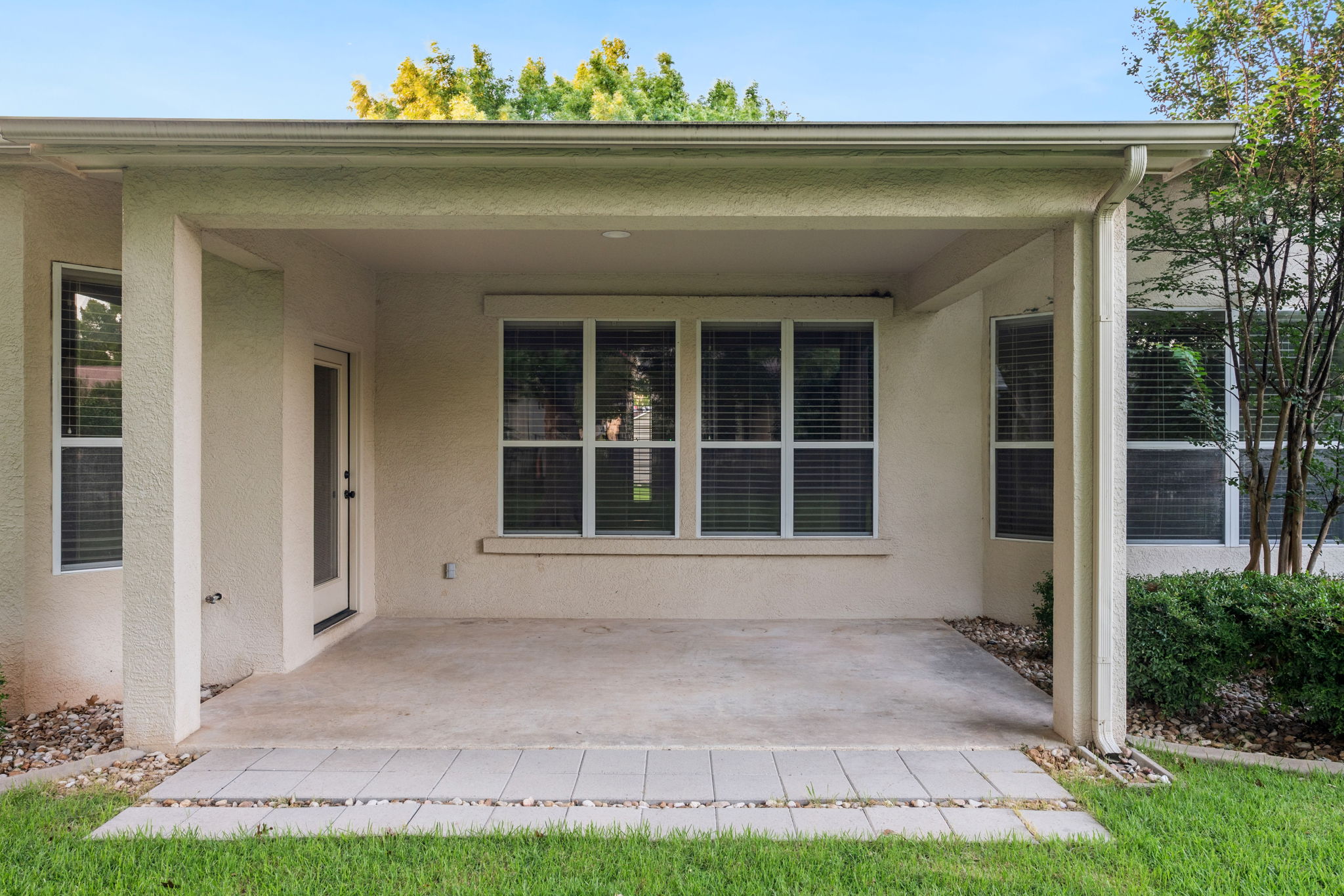 137 Trail Rider Way Georgetown, TX 78633 - Photo 21 of 29 A covered concrete patio provides an inviting outdoor living space.