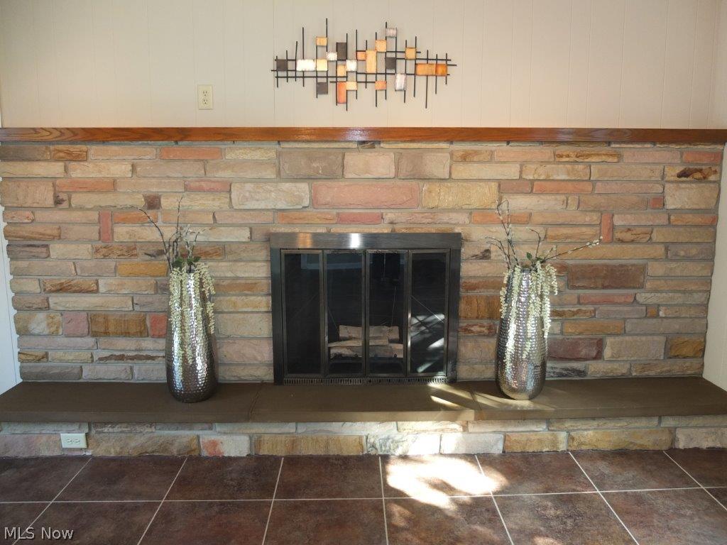264 South Hametown Road Akron, OH 44321 - Photo 19 of 25 Fireplace in the family room.
