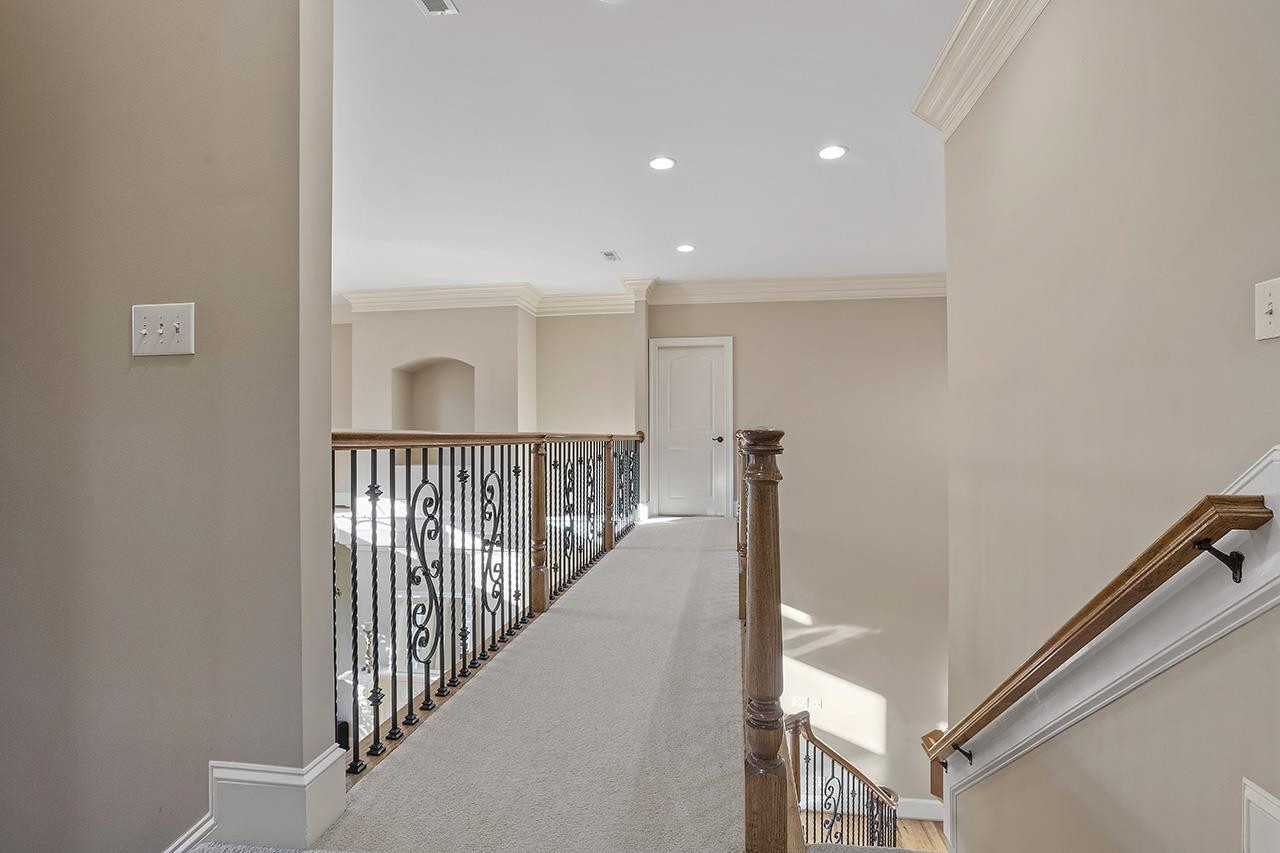 1009 Heydon Court Raleigh, NC 27614 - Photo 56 of 89 Room at the end of the hallway is climate controlled and has many possibilities for use Hallway