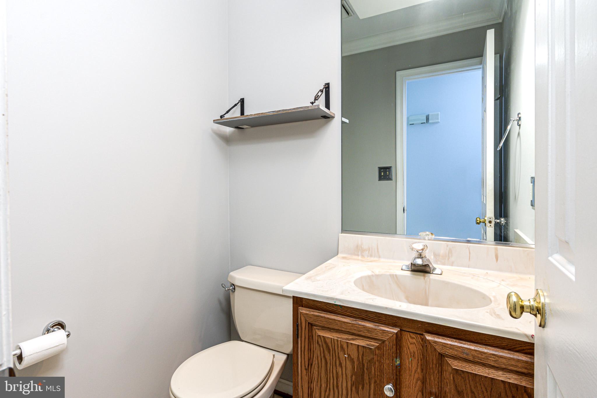 1346 Old Water Oak Point Road Pasadena, MD 21122 - Photo 14 of 33 Half bath - main level