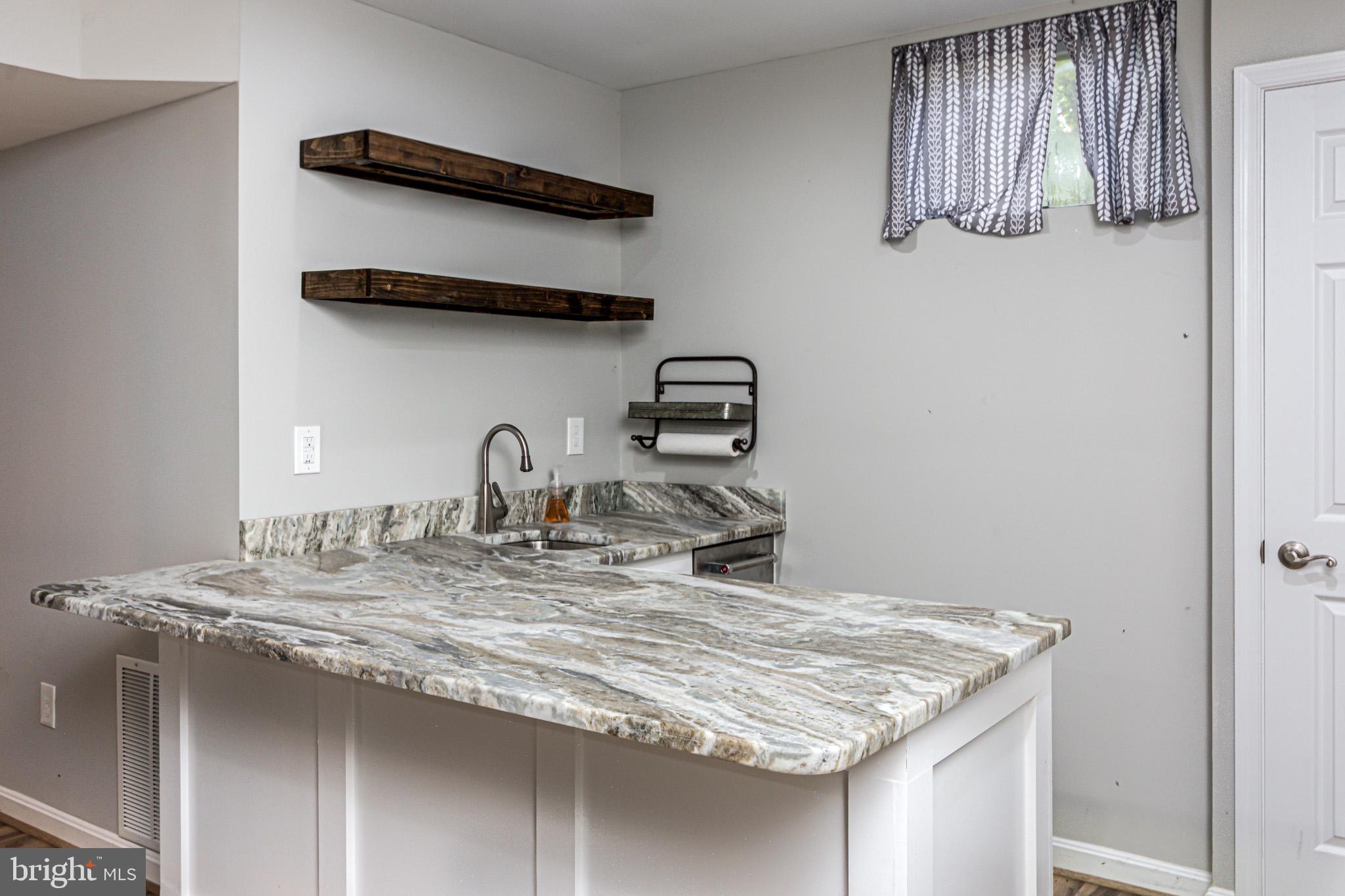 1346 Old Water Oak Point Road Pasadena, MD 21122 - Photo 27 of 33 Wet bar