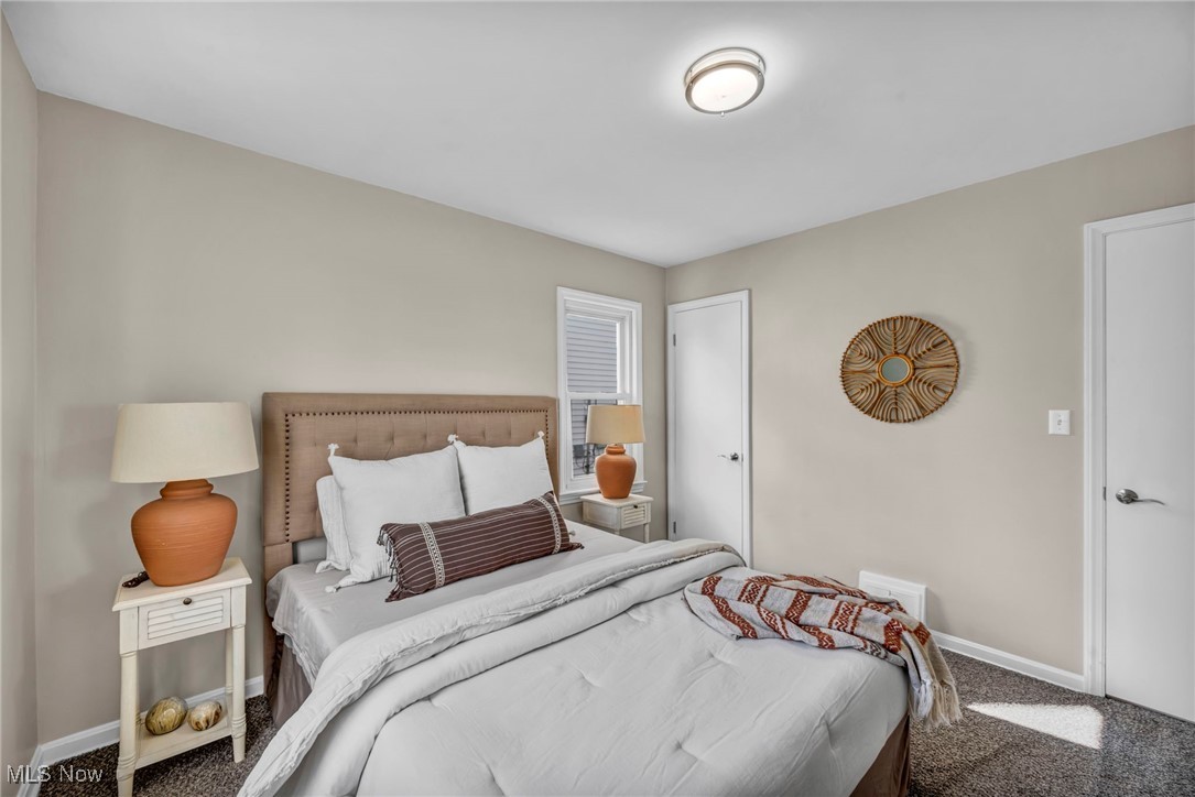 1560 Douglas Road Wickliffe, OH 44092 - Photo 21 of 39 Bedroom with carpet floors and baseboards